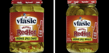 two jars of vlasic kosher dill pickles with frank's red hot sauce on black background
