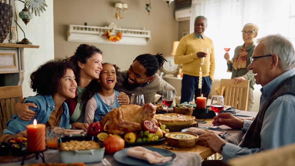 Family gathers for Thanksgiving dinner