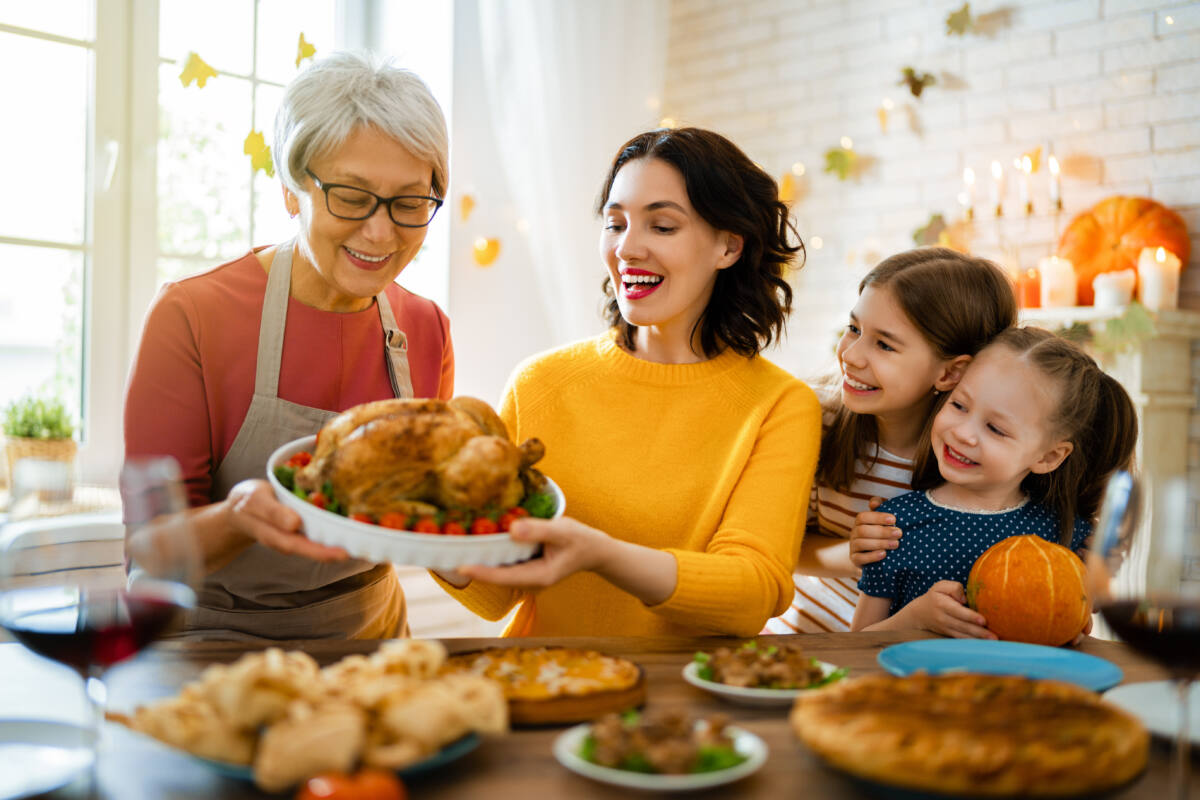 Family prepares Thanksgiving turkey