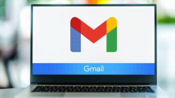 Laptop displaying Gmail logo
