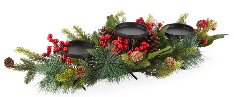 artificial greenery with red berries and candle holders