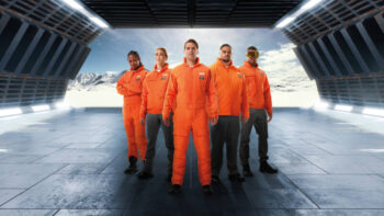 Models wear orange Columbia Skywalker Pilot Collection jackets