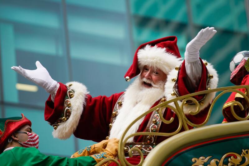 Santa greets people at the Macy's Thanksgiving Parade in 2021
