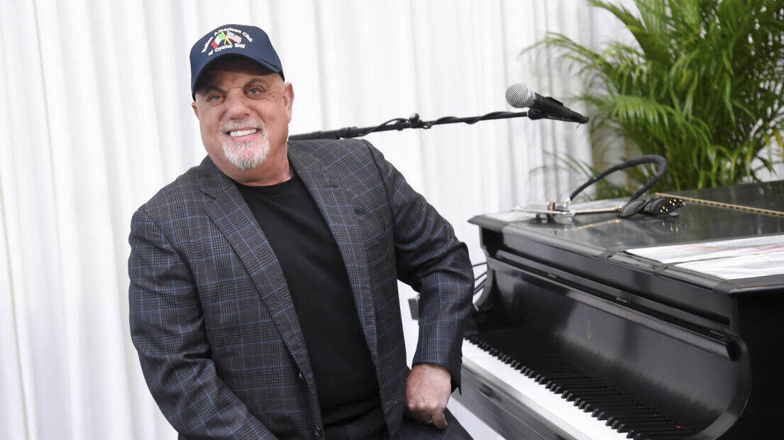 Billy Joel’s daughters, ages 6 and 8, joined him on stage for a Christmas song