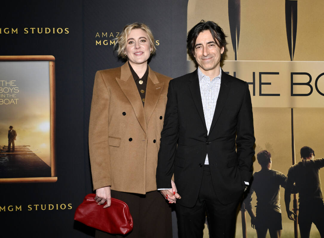 Greta Gerwig and Noah Baumbach pose together on the red carpet