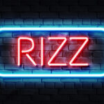 Neon sign reads 'rizz'