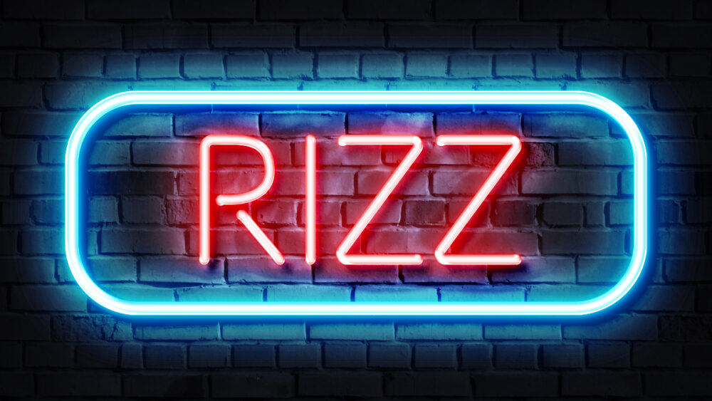 Neon sign reads 'rizz'