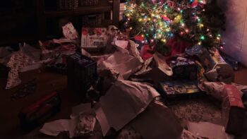 Unwrapped gifts under Scott and Katie Reintgen's tree after toddler unwrapped them all