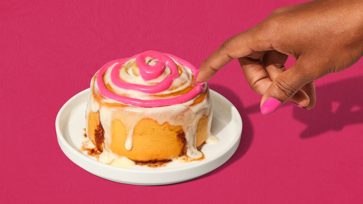 Cinnabon cinnamon roll with pink frosting to celebrate the new "Mean Girls" movie.
