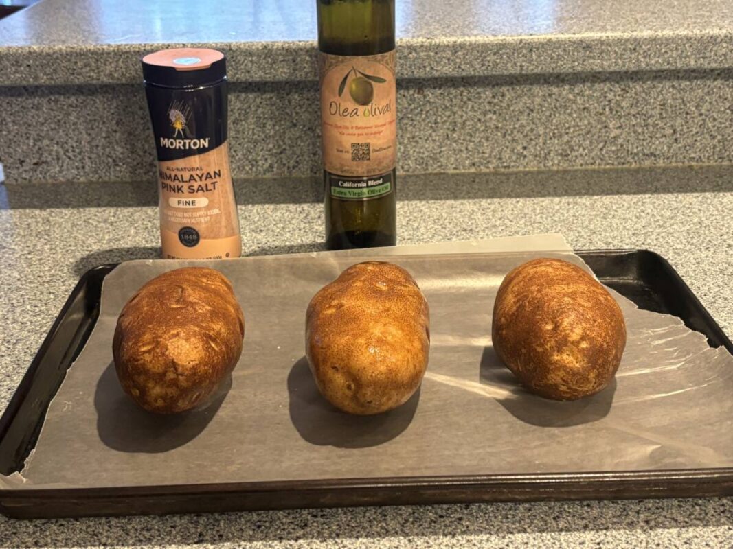 three baked potatoes