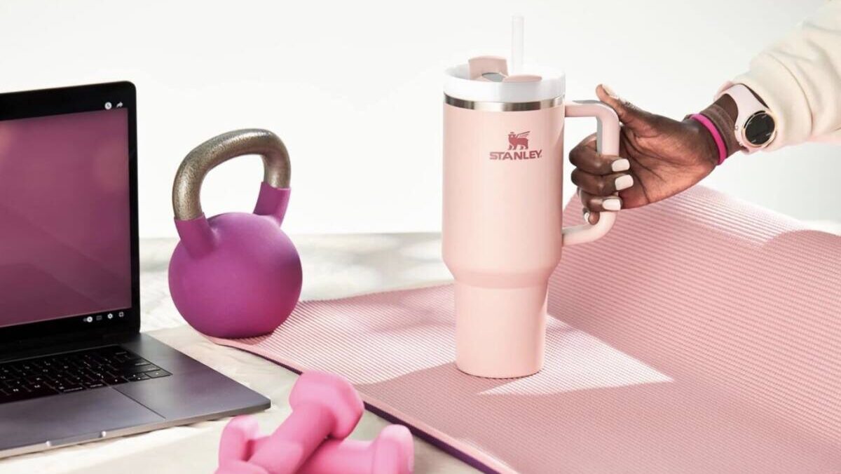 pink stanley cup with workout items