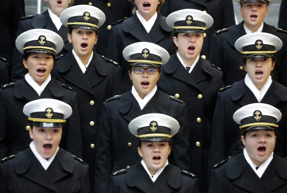 Members of U.S. Naval Academy singing 