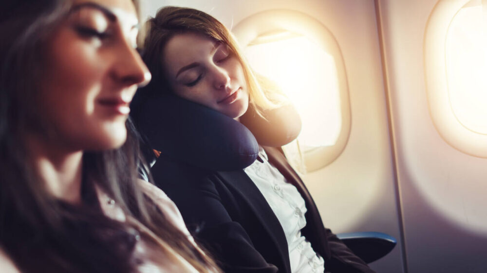 People sleep on airplane