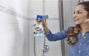 woman using tilex mold and mildew cleaner