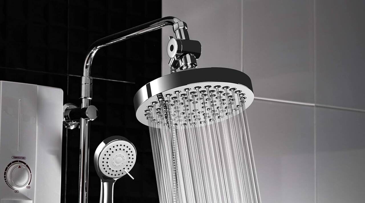 A showerhead with a detachable head is installed in a shower.