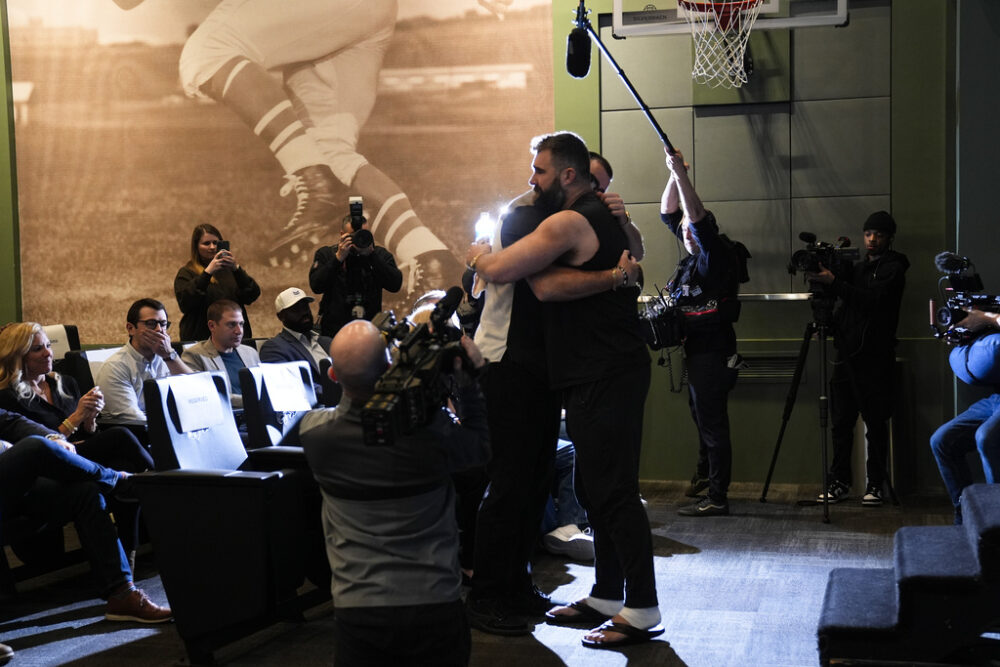 Jason Kelce and his brother Travis embrace at Jason’s retirement announcement.