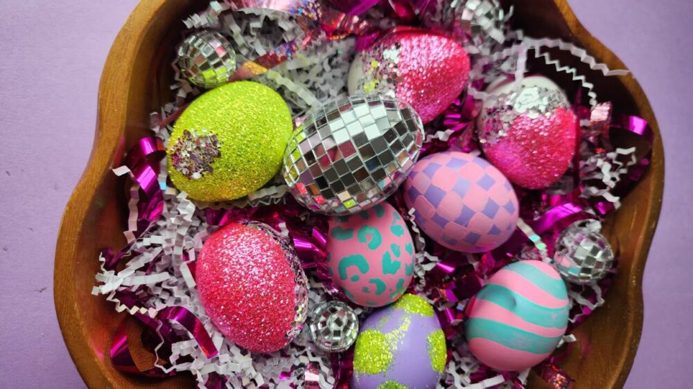 eggs decorated with glitter and mirrors to make a disco ball