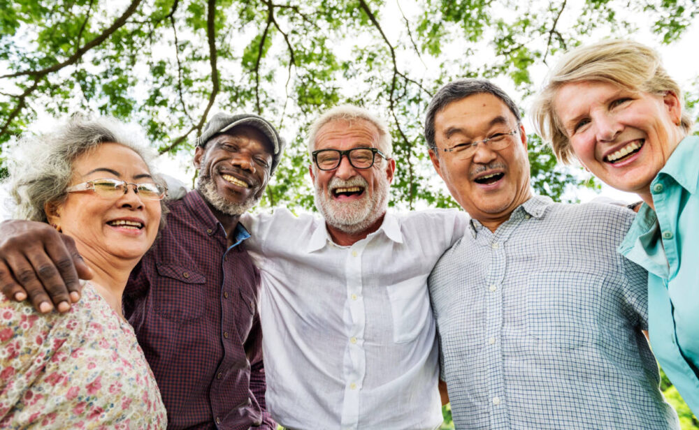 Group of senior citizens smiling at the camera