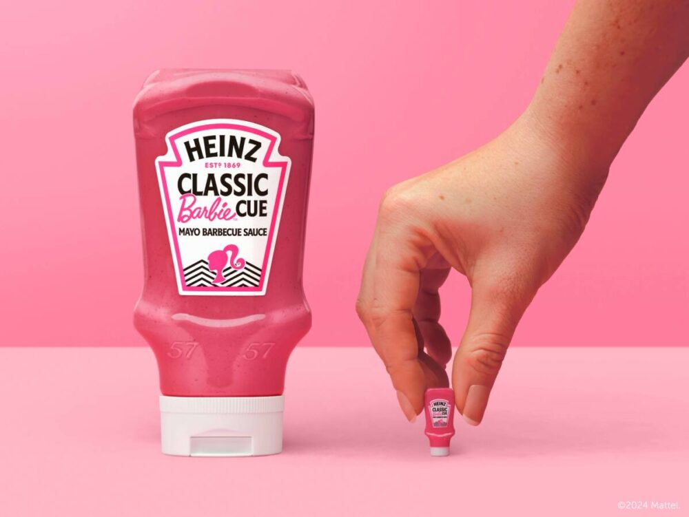 a bottle of Barbie-inspired pink barbecue sauce with a mini version.
